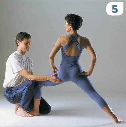 Warrior Pose II with Donna Farhi and Partner