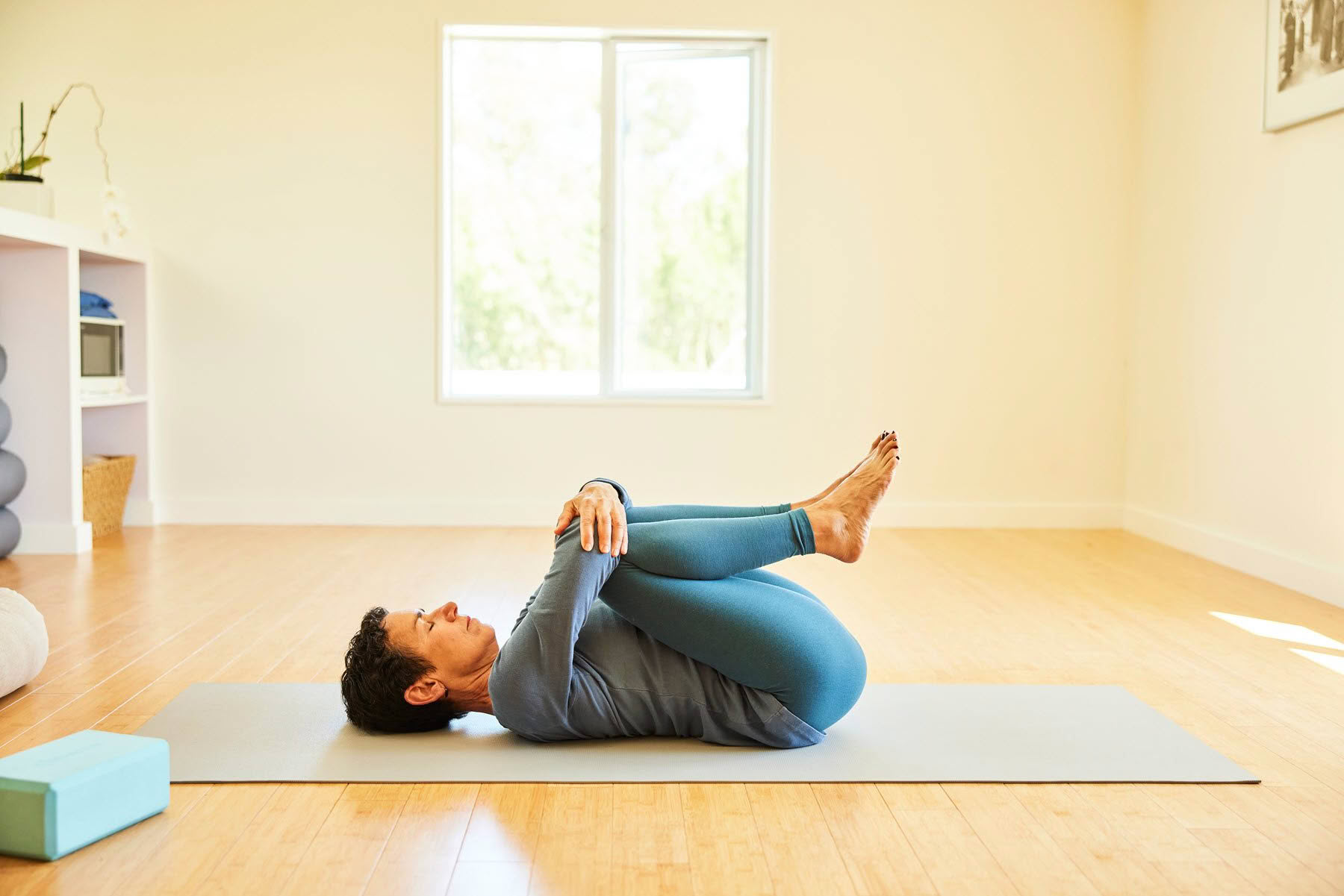 Donna Farhi supine on mat 